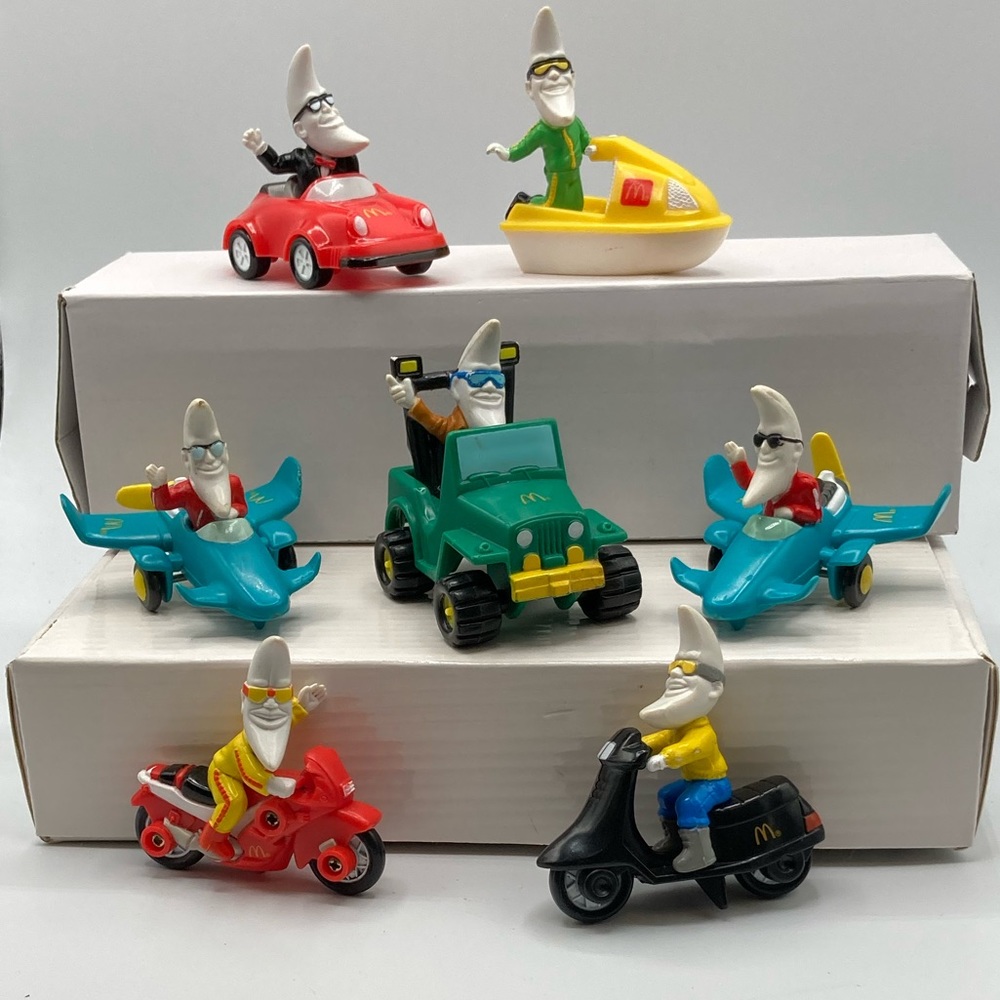 Vintage McDonald’s 1998 Mac Tonight, Set of 7. Plane with blue sunglasses.